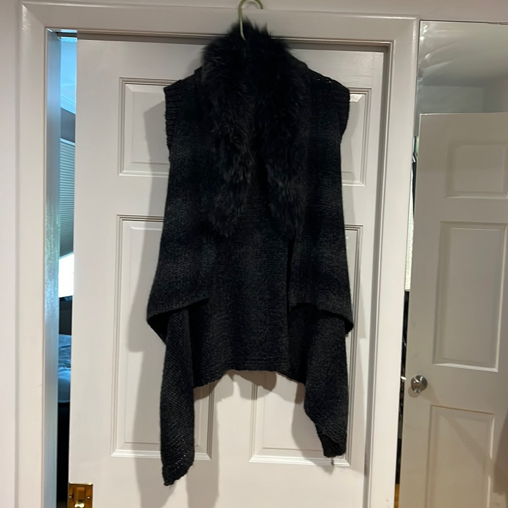Sleeveless sweater cover up with removable soft fur collar. Only worn once.